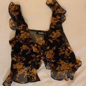 Misguided going out top. Sheer throughout besides chest.  medium.